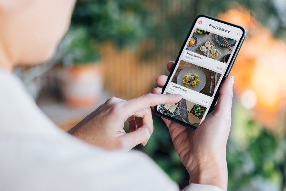man ordering food by app